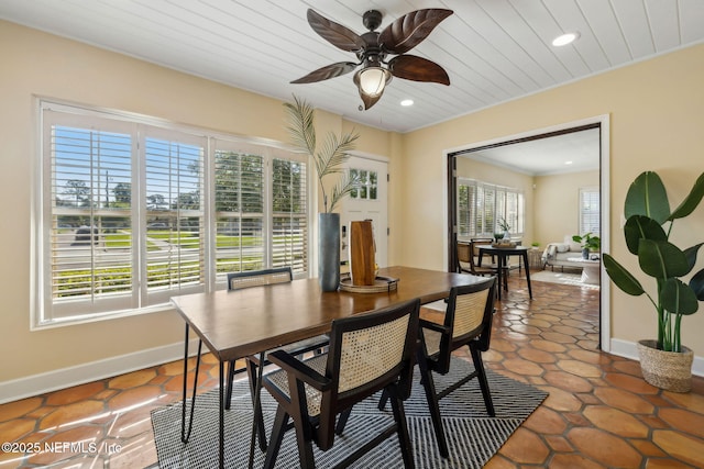 dining space featuring baseboards, ceiling fan, and recessed lighting