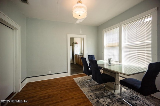 831 Ashford St, Jacksonville, FL 32208 - dining area with wood finished floors and baseboards