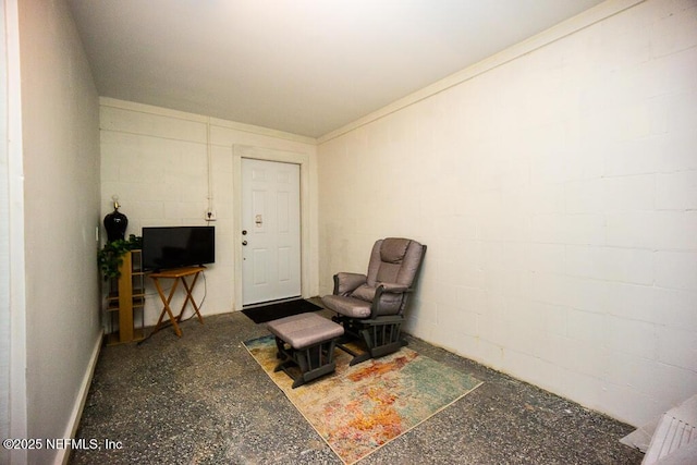 831 Ashford St, Jacksonville, FL 32208 - sitting room with concrete block wall