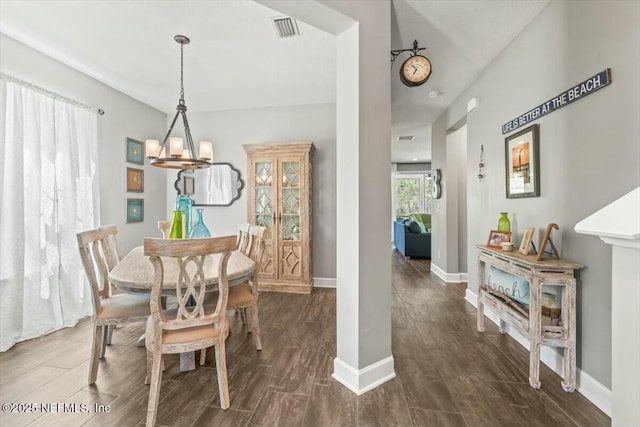 489 Citrus Ridge Dr, Ponte Vedra, FL 32081 - dining room featuring visible vents, baseboards, and dark wood finished floors