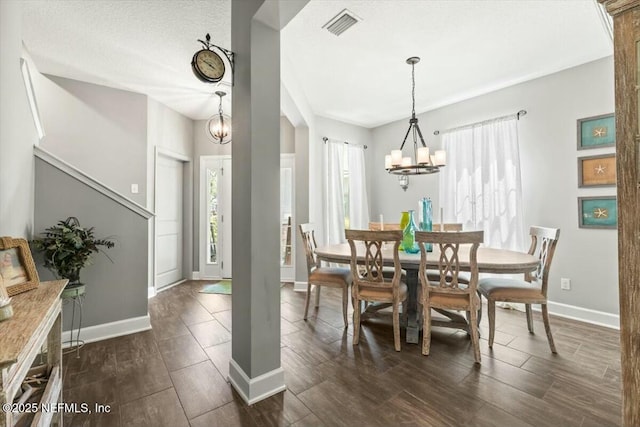 489 Citrus Ridge Dr, Ponte Vedra, FL 32081 - dining space with wood tiled floor, baseboards, a notable chandelier, and visible vents