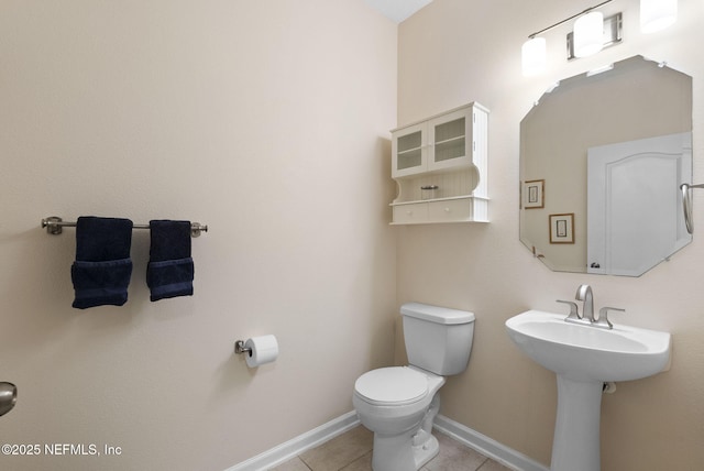 169 S Field Crest Dr, Saint Augustine, FL 32092 - half bath featuring tile patterned flooring, baseboards, and toilet
