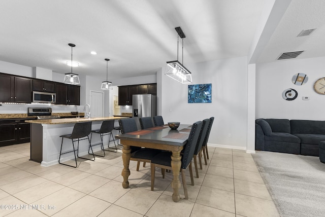 169 S Field Crest Dr, Saint Augustine, FL 32092 - dining space featuring visible vents, baseboards, and light tile patterned floors