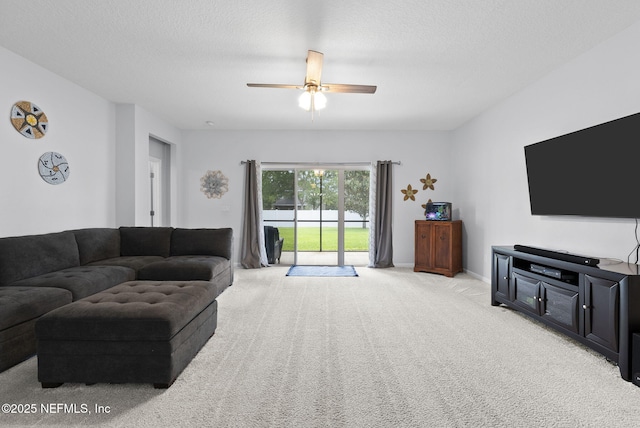 169 S Field Crest Dr, Saint Augustine, FL 32092 - living area with baseboards, carpet, and ceiling fan