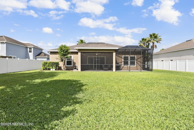 169 S Field Crest Dr, Saint Augustine, FL 32092 - rear view of property with a yard, a fenced backyard, and stucco siding