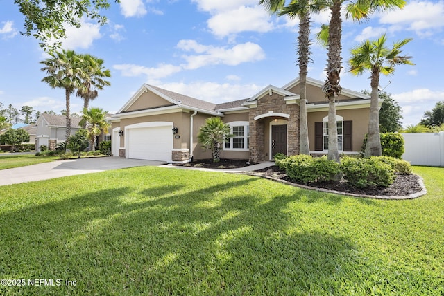 169 S Field Crest Dr, Saint Augustine, FL 32092 - view of front of property featuring fence, stone siding, stucco siding, concrete driveway, and an attached garage