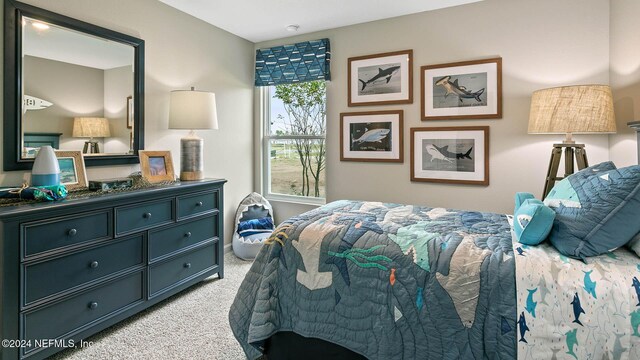 173 Greenwood Dr, Palm Coast, FL 32137 - bedroom with light carpet