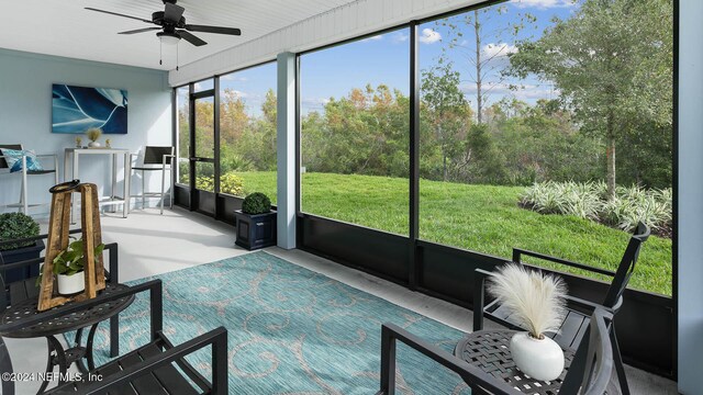 173 Greenwood Dr, Palm Coast, FL 32137 - sunroom featuring ceiling fan