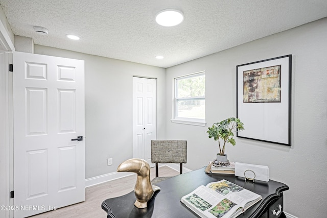 310 Capella Rd, Orange Park, FL 32073 - home office featuring recessed lighting, baseboards, a textured ceiling, and wood finished floors