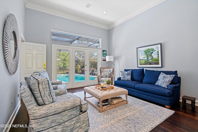 living room with wood-type flooring, french doors, baseboards, and crown molding