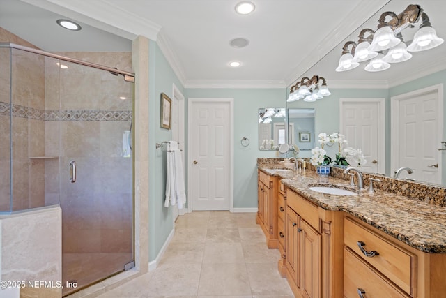 bathroom featuring double vanity, tile patterned floors, a stall shower, and a sink