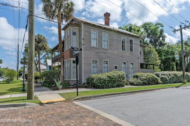 627 Emmett St, Palatka, FL 32177 - view of front of home with a chimney