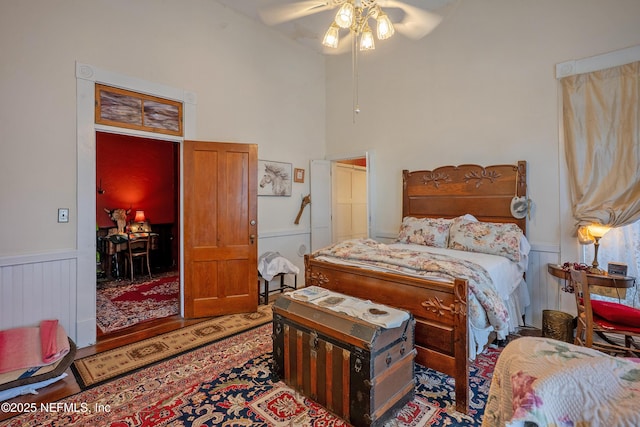 627 Emmett St, Palatka, FL 32177 - bedroom with wood finished floors and wainscoting