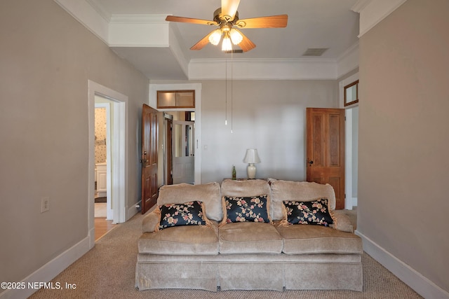 627 Emmett St, Palatka, FL 32177 - living room featuring crown molding, visible vents, ceiling fan, and baseboards