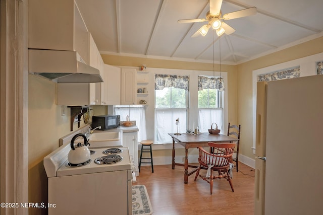 627 Emmett St, Palatka, FL 32177 - kitchen with white appliances, white cabinetry, open shelves, custom exhaust hood, and light wood finished floors