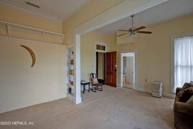 627 Emmett St, Palatka, FL 32177 - interior space featuring crown molding, a ceiling fan, and visible vents