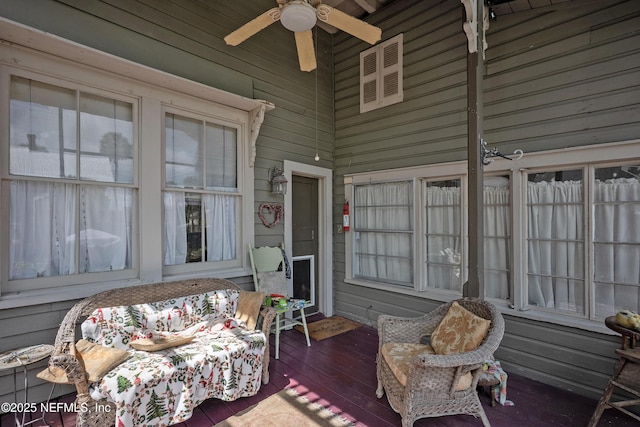 627 Emmett St, Palatka, FL 32177 - sunroom featuring a ceiling fan