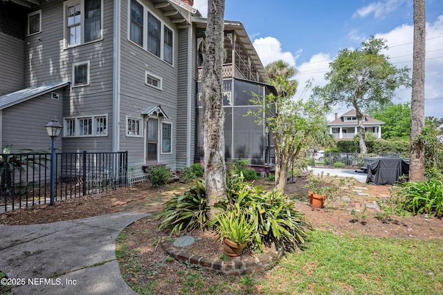 627 Emmett St, Palatka, FL 32177 - view of side of home with fence