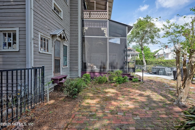627 Emmett St, Palatka, FL 32177 - view of yard with a patio area, fence, and a sunroom
