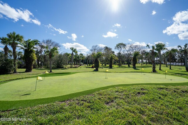 8 Island Estates Pkwy, Palm Coast, FL 32137 - view of home's community with golf course view and a lawn