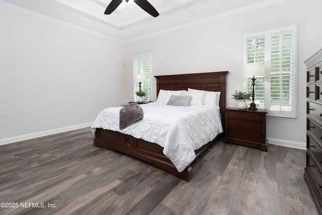 184 Rockcreek Dr, Saint Johns, FL 32259 - bedroom with dark wood-style floors, baseboards, ornamental molding, a tray ceiling, and a ceiling fan