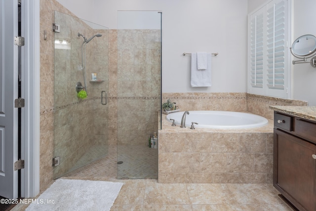 184 Rockcreek Dr, Saint Johns, FL 32259 - bathroom featuring a bath, a stall shower, and vanity