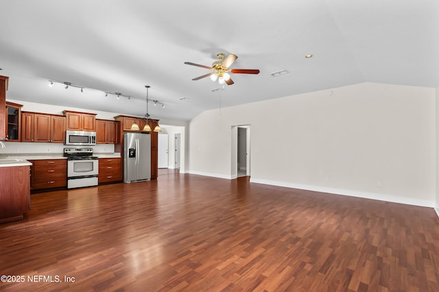 unfurnished living room with dark wood-style flooring, a ceiling fan, and lofted ceiling