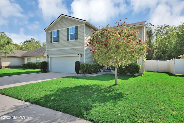 3699 Summit Oaks Dr, Green Cove Springs, FL 32043 - view of front of house featuring an attached garage, concrete driveway, a front yard, and fence