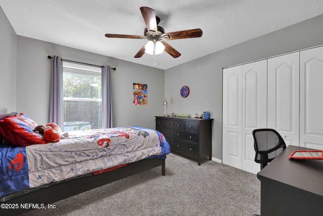 3699 Summit Oaks Dr, Green Cove Springs, FL 32043 - carpeted bedroom with a closet, a ceiling fan, and a textured ceiling