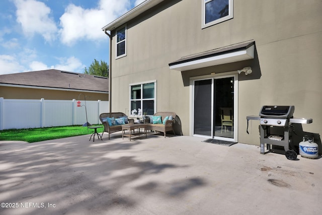 3699 Summit Oaks Dr, Green Cove Springs, FL 32043 - back of house featuring outdoor lounge area, fence, a patio, and stucco siding