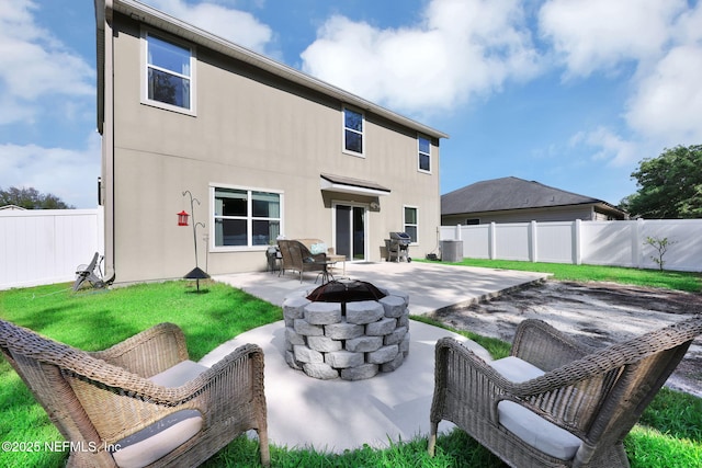 3699 Summit Oaks Dr, Green Cove Springs, FL 32043 - rear view of property with a yard, a patio area, a fenced backyard, and stucco siding