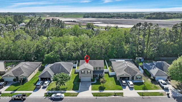3699 Summit Oaks Dr, Green Cove Springs, FL 32043 - drone / aerial view featuring a residential view and a view of trees