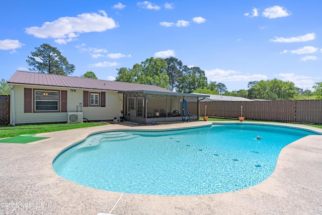 1648 Rhonda Dr, Middleburg, FL 32068 - view of pool featuring ac unit, fence, a fenced in pool, and a sunroom