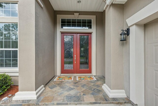 244 W Berkswell Dr, Saint Johns, FL 32259 - doorway to property featuring french doors and stucco siding