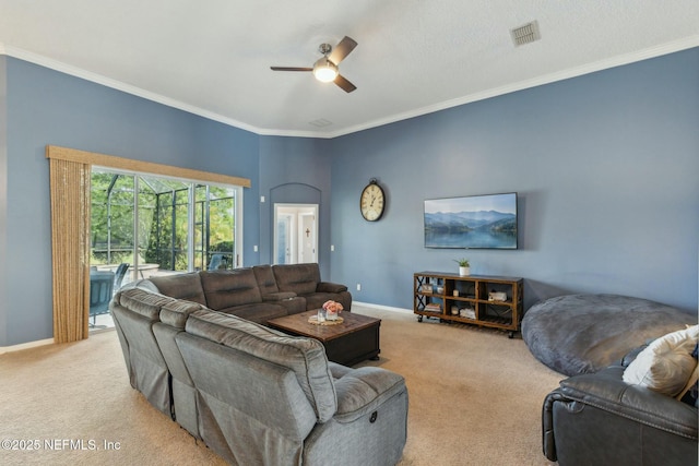 244 W Berkswell Dr, Saint Johns, FL 32259 - carpeted living room featuring crown molding, ceiling fan, baseboards, and visible vents