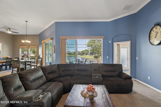 244 W Berkswell Dr, Saint Johns, FL 32259 - living area with baseboards, ornamental molding, carpet flooring, visible vents, and ceiling fan with notable chandelier