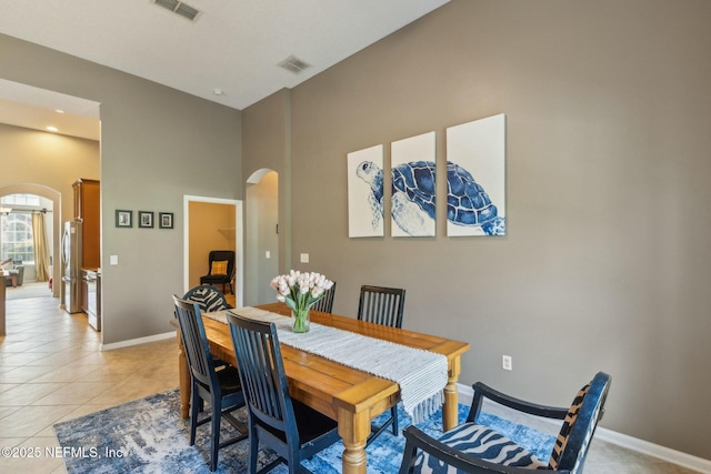 244 W Berkswell Dr, Saint Johns, FL 32259 - dining room with arched walkways, light tile patterned floors, visible vents, and baseboards