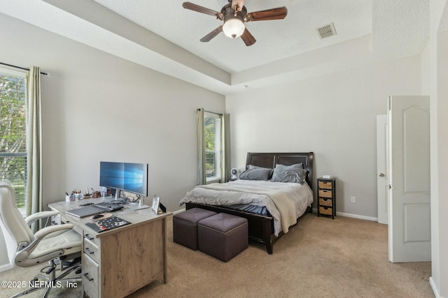 244 W Berkswell Dr, Saint Johns, FL 32259 - bedroom with a tray ceiling, visible vents, multiple windows, and light colored carpet
