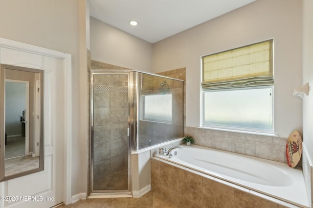 244 W Berkswell Dr, Saint Johns, FL 32259 - bathroom with a shower stall, tile patterned floors, and a garden tub