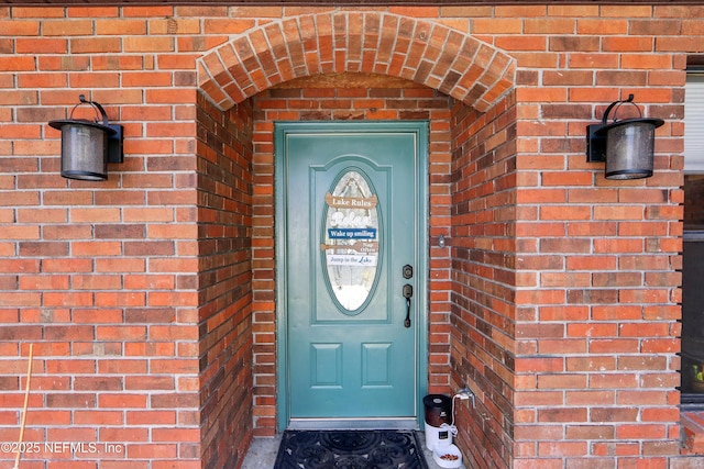 5822 Silver Sands Cir, Keystone Heights, FL 32656 - view of exterior entry featuring brick siding