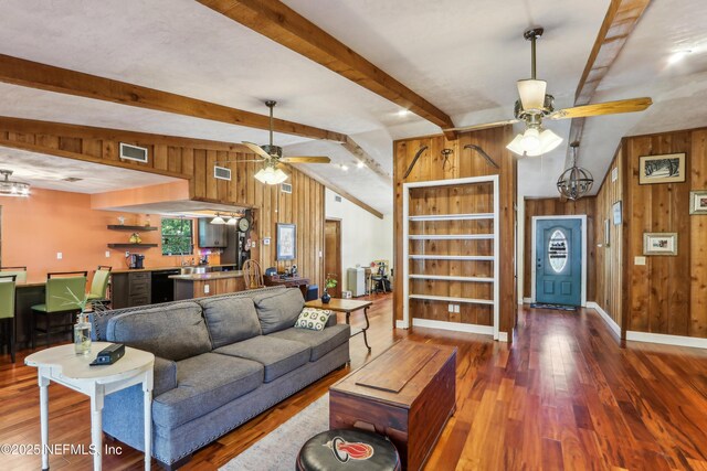 5822 Silver Sands Cir, Keystone Heights, FL 32656 - living room with wooden walls, visible vents, a ceiling fan, and wood finished floors