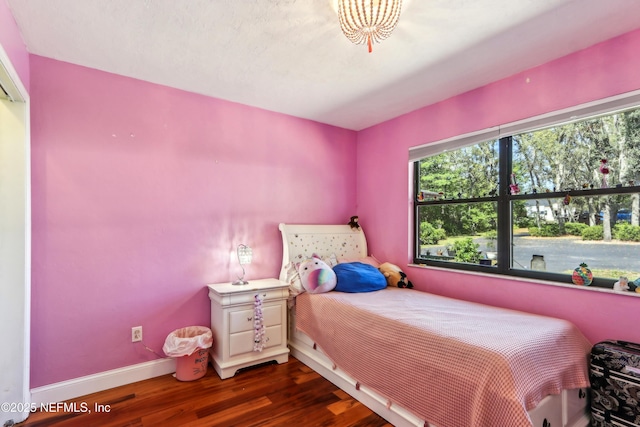 5822 Silver Sands Cir, Keystone Heights, FL 32656 - bedroom with wood finished floors and baseboards