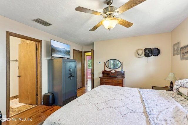 5822 Silver Sands Cir, Keystone Heights, FL 32656 - bedroom with visible vents, ceiling fan, and wood finished floors