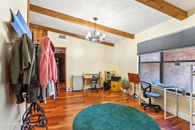 5822 Silver Sands Cir, Keystone Heights, FL 32656 - home office with beam ceiling, wood finished floors, an inviting chandelier, and visible vents