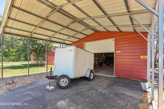 5822 Silver Sands Cir, Keystone Heights, FL 32656 - view of parking with a detached garage