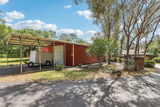 5822 Silver Sands Cir, Keystone Heights, FL 32656 - view of outdoor structure with a carport
