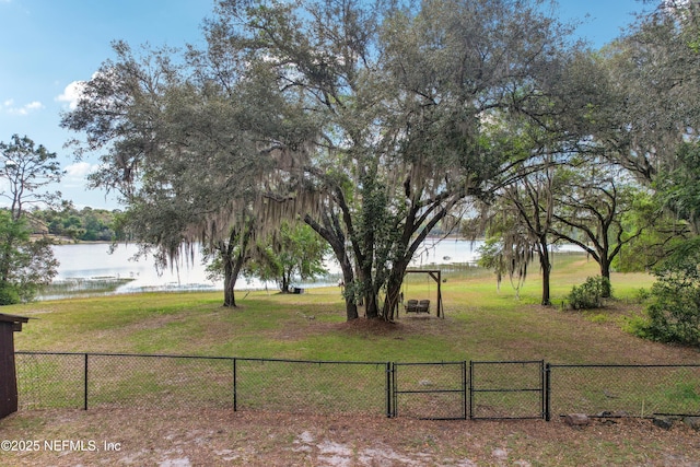 5822 Silver Sands Cir, Keystone Heights, FL 32656 - view of yard featuring a water view, fence, and a gate
