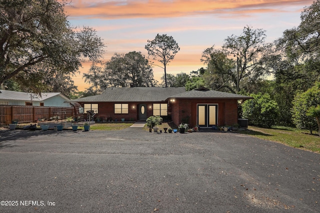 5822 Silver Sands Cir, Keystone Heights, FL 32656 - view of front of house with french doors and fence