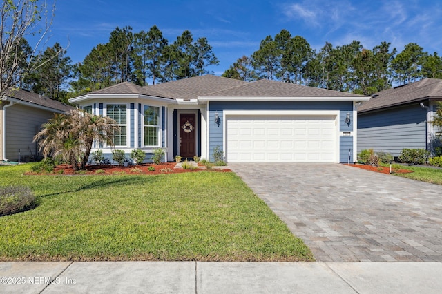 83 Woodgate Dr, Ponte Vedra, FL 32081 - single story home with a front yard, an attached garage, and decorative driveway