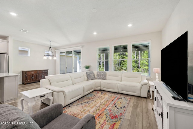 83 Woodgate Dr, Ponte Vedra, FL 32081 - living room with visible vents, light wood-type flooring, and recessed lighting